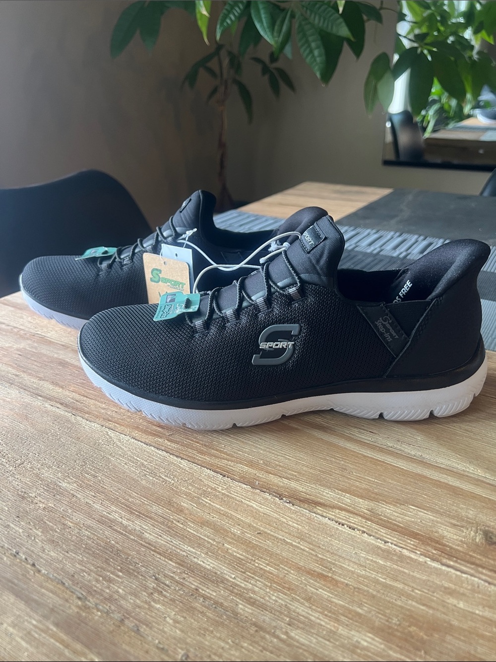 Women’s black Skechers